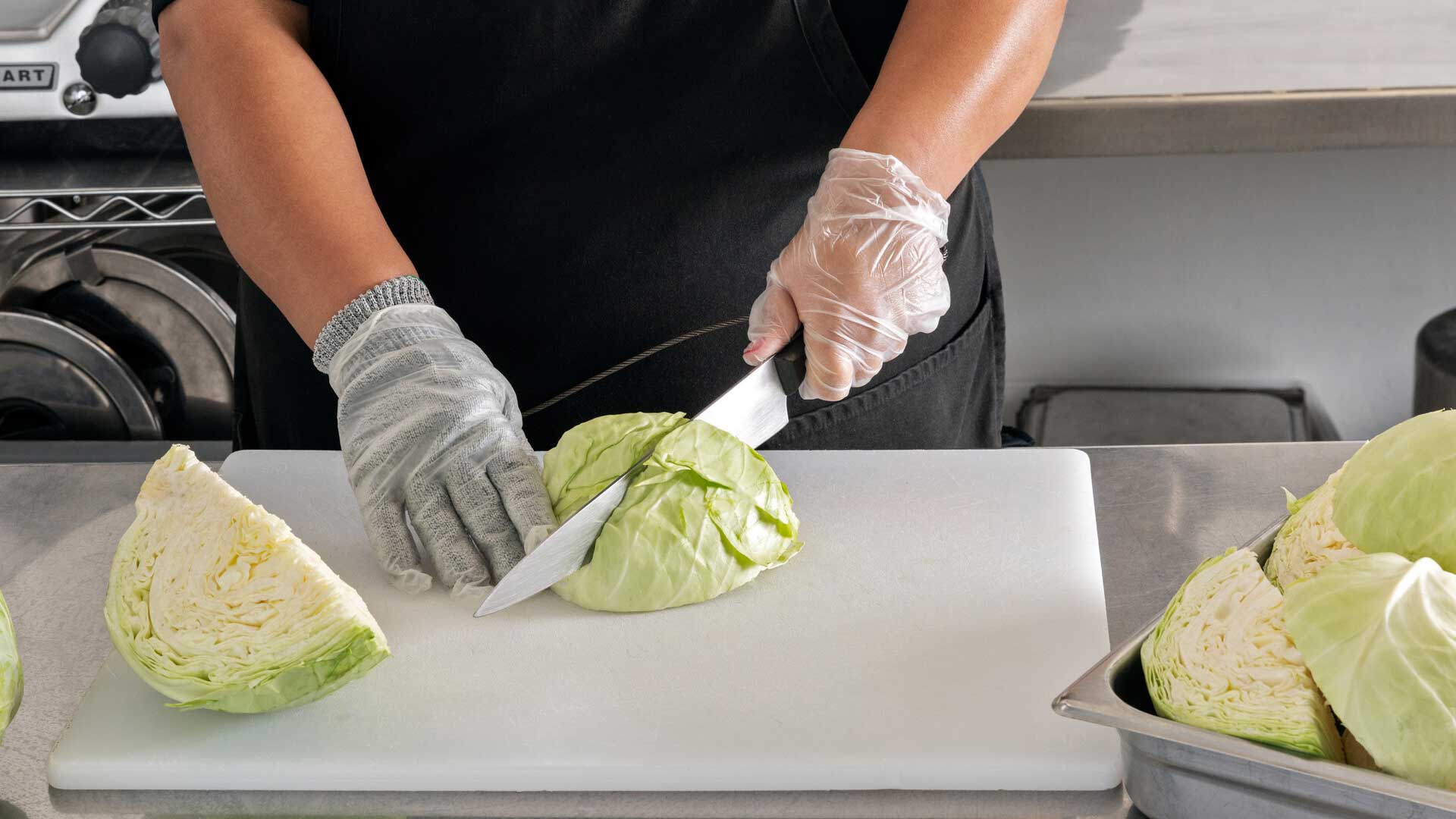 Cook cutting cabbage