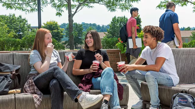 Students having beverages outside
