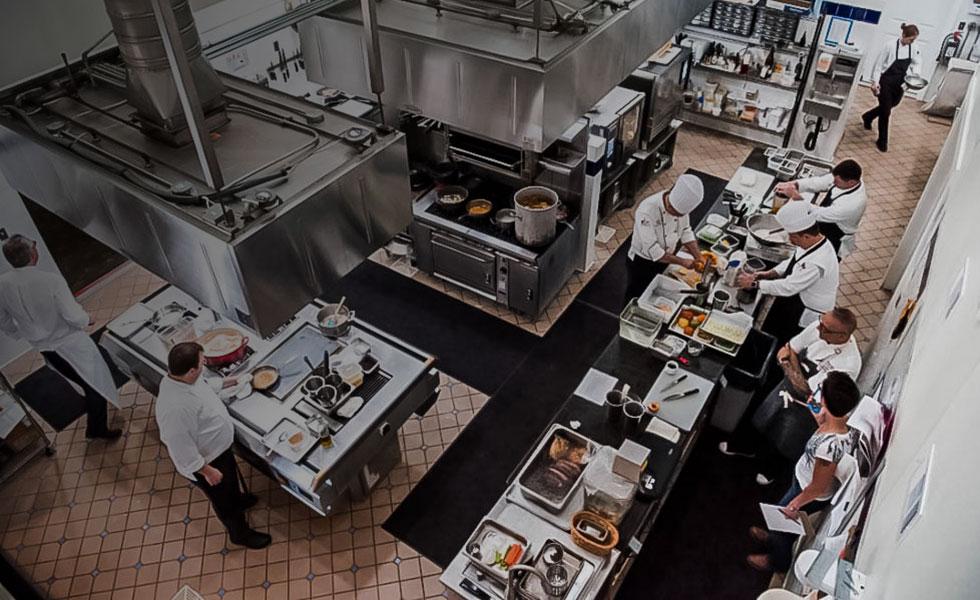 Overhead shot of chefs working in kitchen