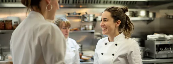 Female chefs in restaurant kitchen