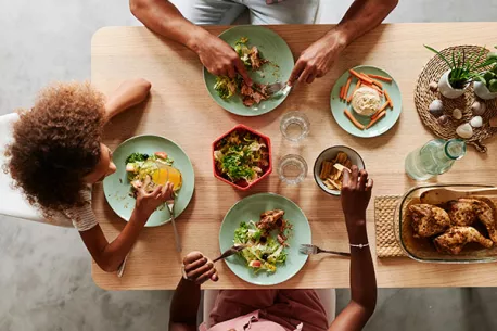 Overhead shot of people eating a table