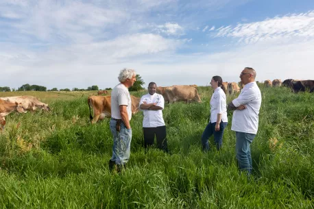 Elior North America chefs talking to farmer