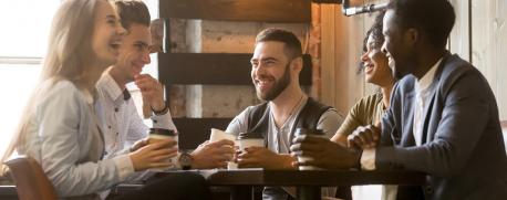Group of young professionals sitting and drinking coffee Group of young professionals sitting and drinking coffee