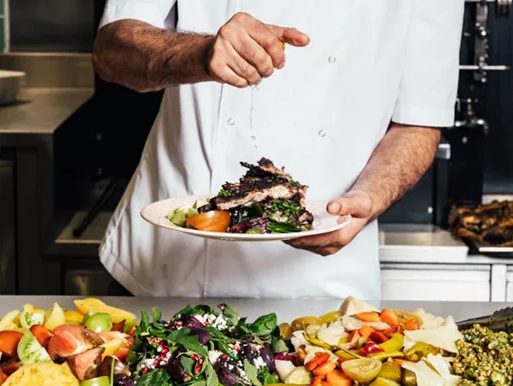 Chef plating food